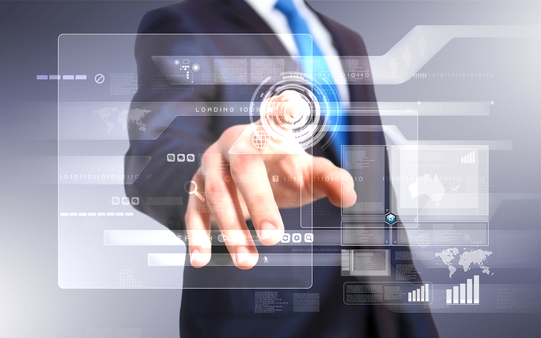 man in a suit pressing one finger on a digital display