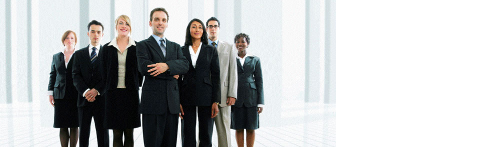 group of seven technology employees in nice dress clothes ready for their IT outsourcing jobs at SSI